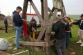 Capt. Stoerzinger and others look into the well